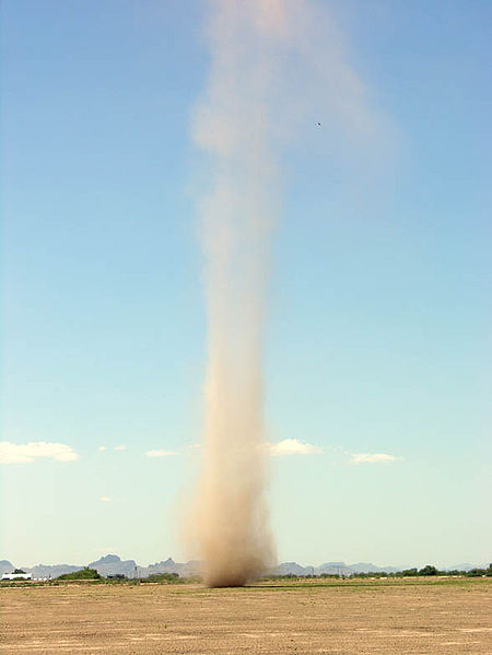 This spectacular photo shows a huge dust whirlwind as it spirals along the ground in Arizona, USA.